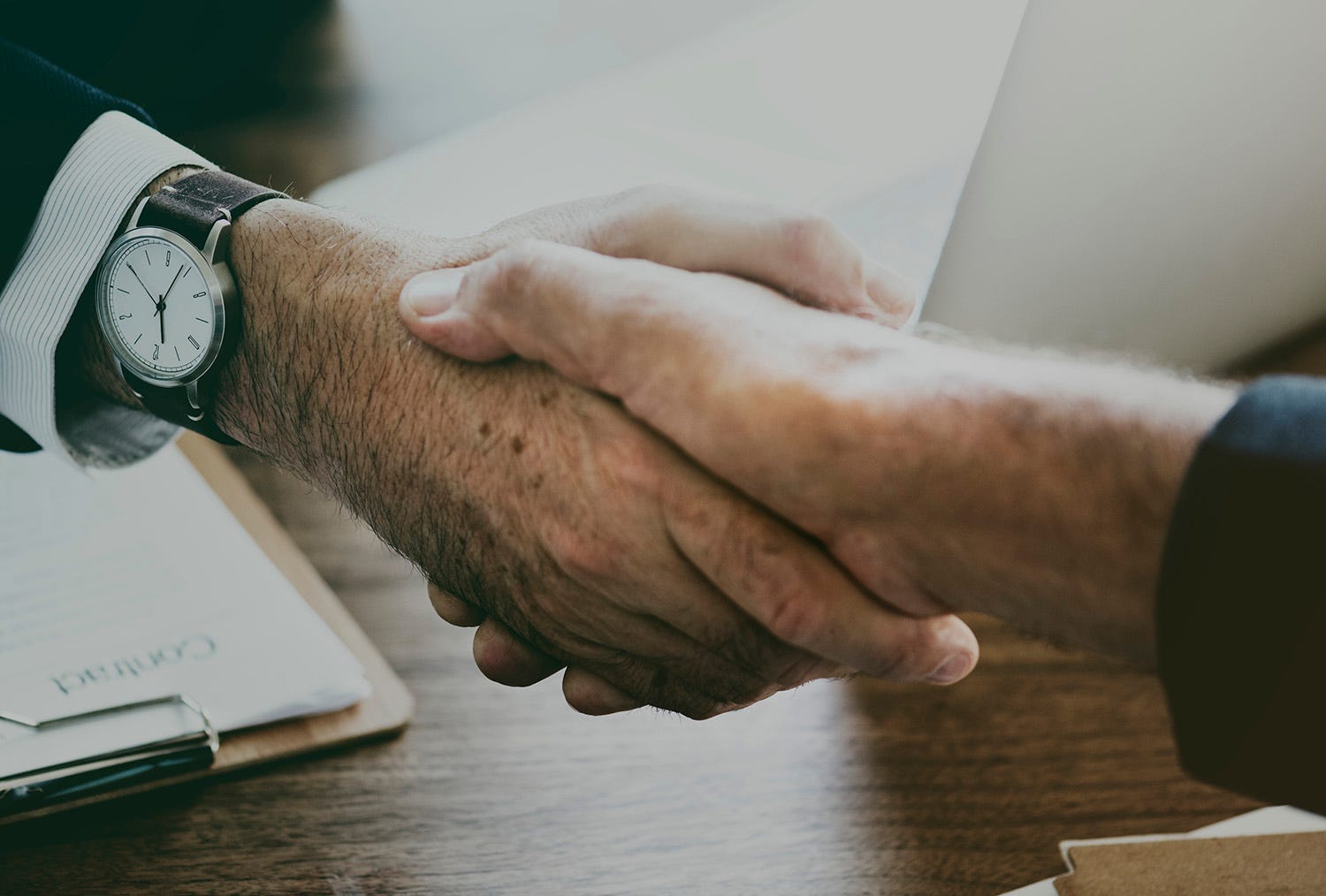 Men shaking hands in agreement